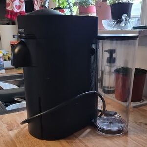 Nespresso Matte Black Coffee Maker with Clear Reservoir